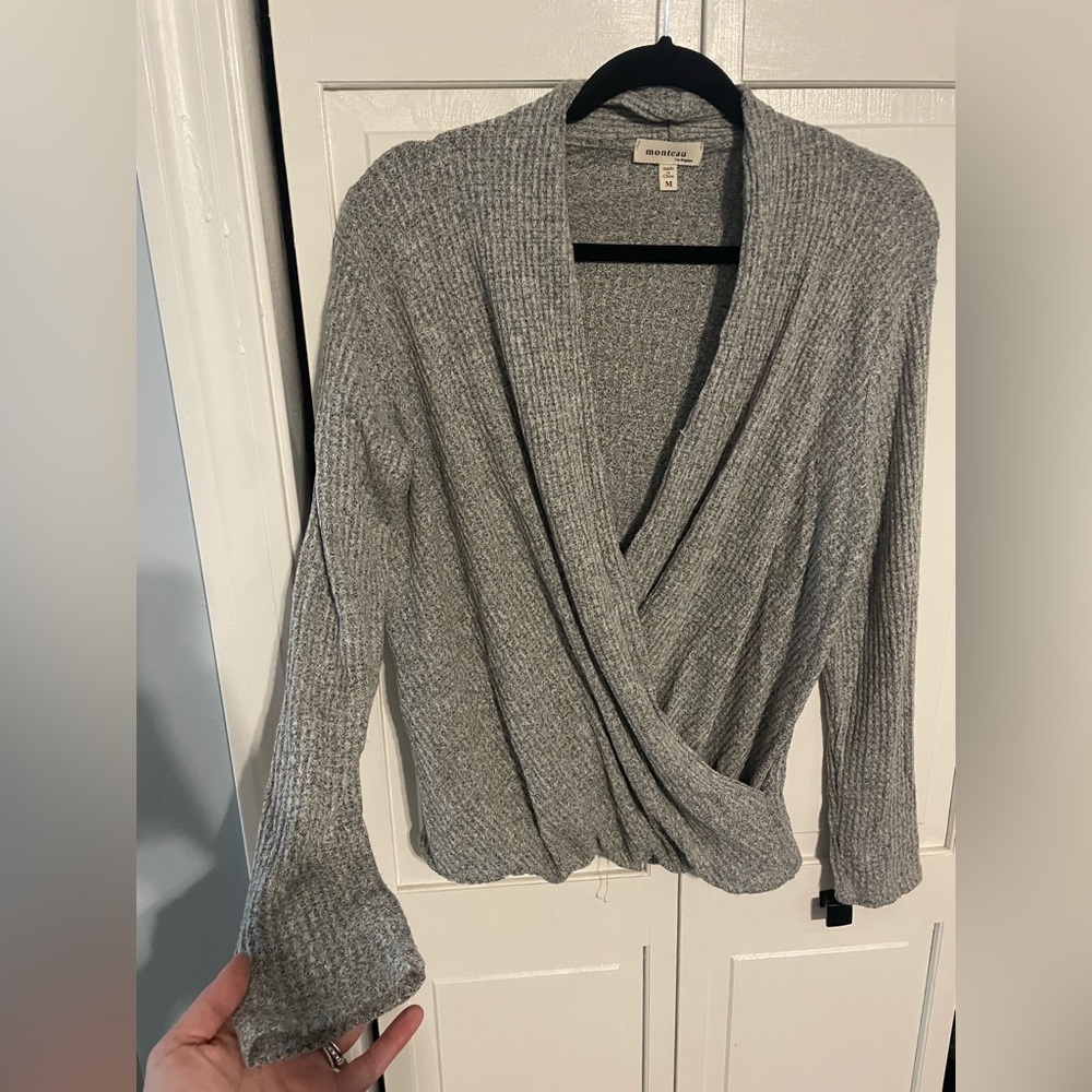 Gray knit crossover sweater